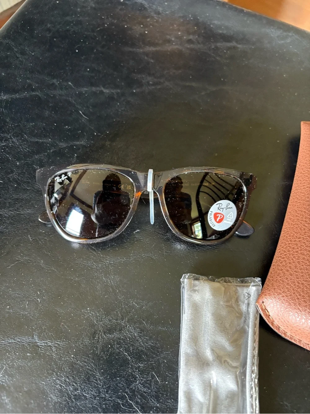 Ray-Ban sunglasses brand new w case and clean cloth.Never out of style! Torti